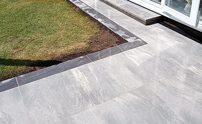 Garden Patio Elegantly Transformed with Sleek Porcelain Tiles